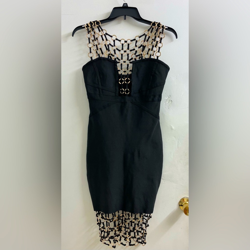 Elegant Black Backless Dress with Intricate Neckline